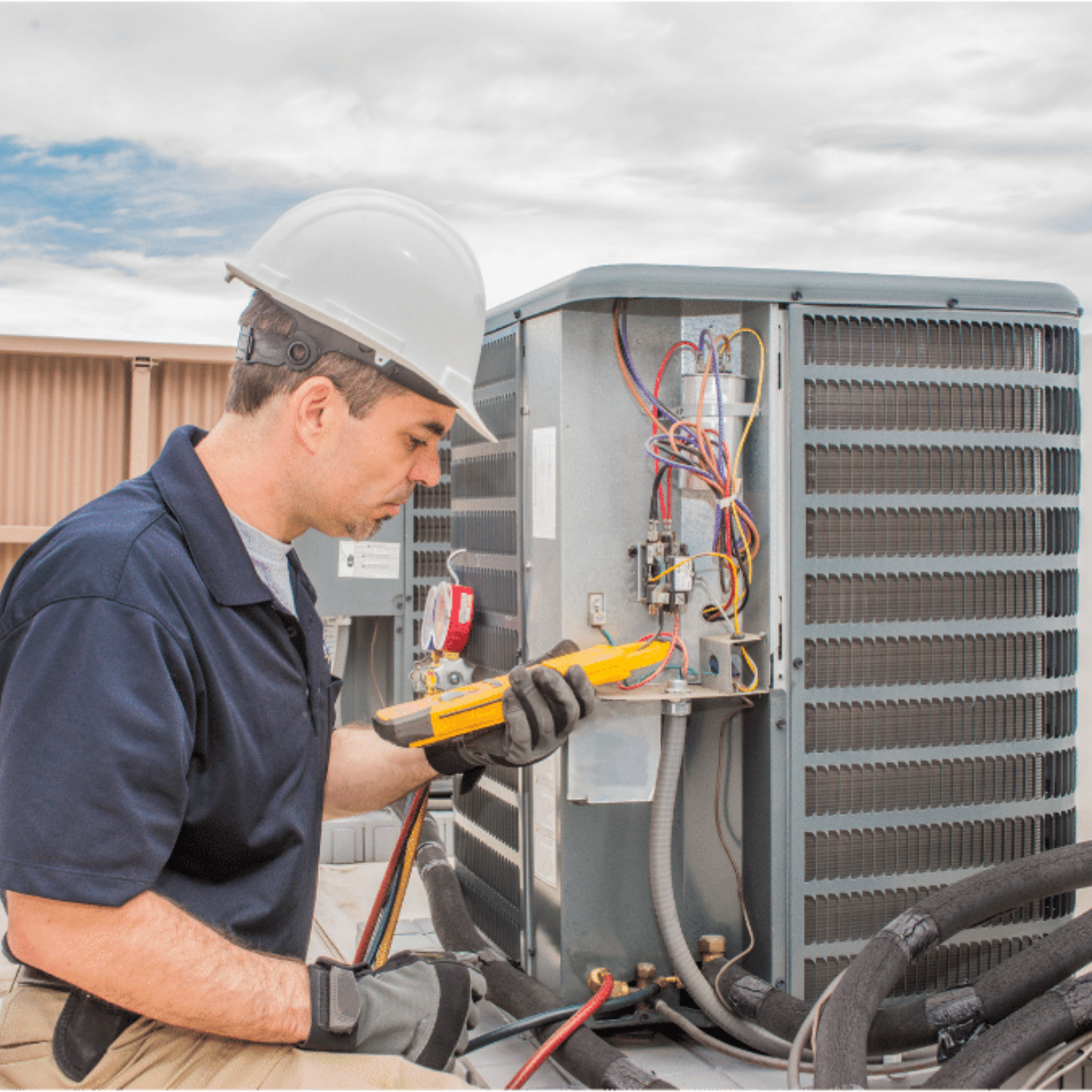 Windsor HVAC Pro HVAC technician servicing a system